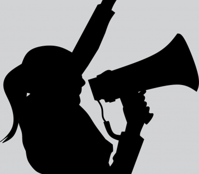 Photo credit: Mohamed Hassan Woman with megaphone